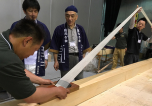 Mr. Kamijo supervising the wide plane demonstration.