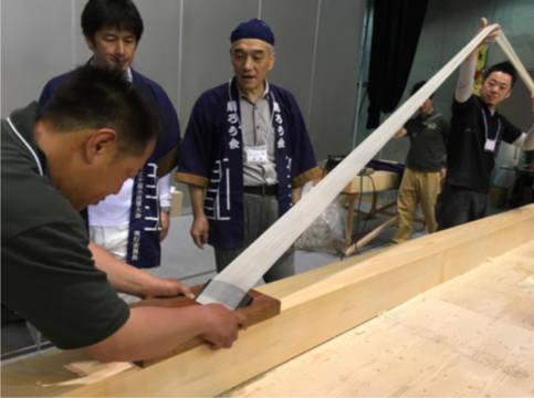 Mr. Kamijo supervising the wide plane demonstration.